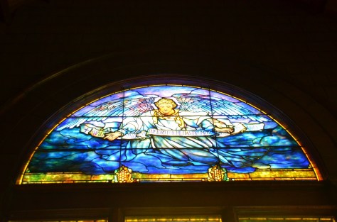 Stain glass by Tiffany -"I will sing unto the Lord, for He has triumphed gloriously."