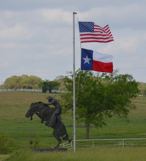Saddlehorn Winery - Bronze and flags in the yard.